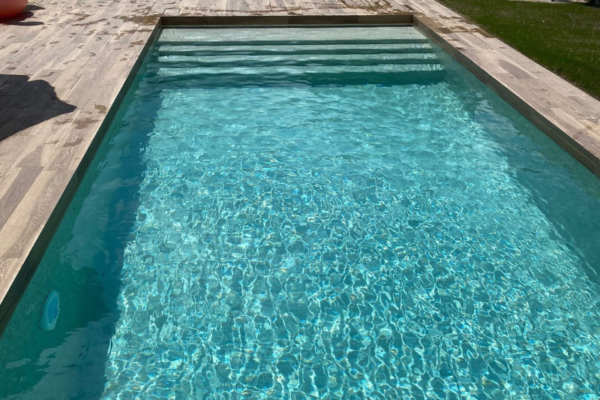 Defelma-piscinas-en-llanes-cubierta-enterrada-exterior-iluminacion